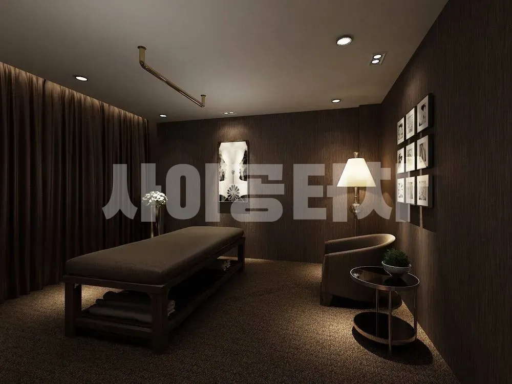 어두운 톤의 차분한 마사지 룸